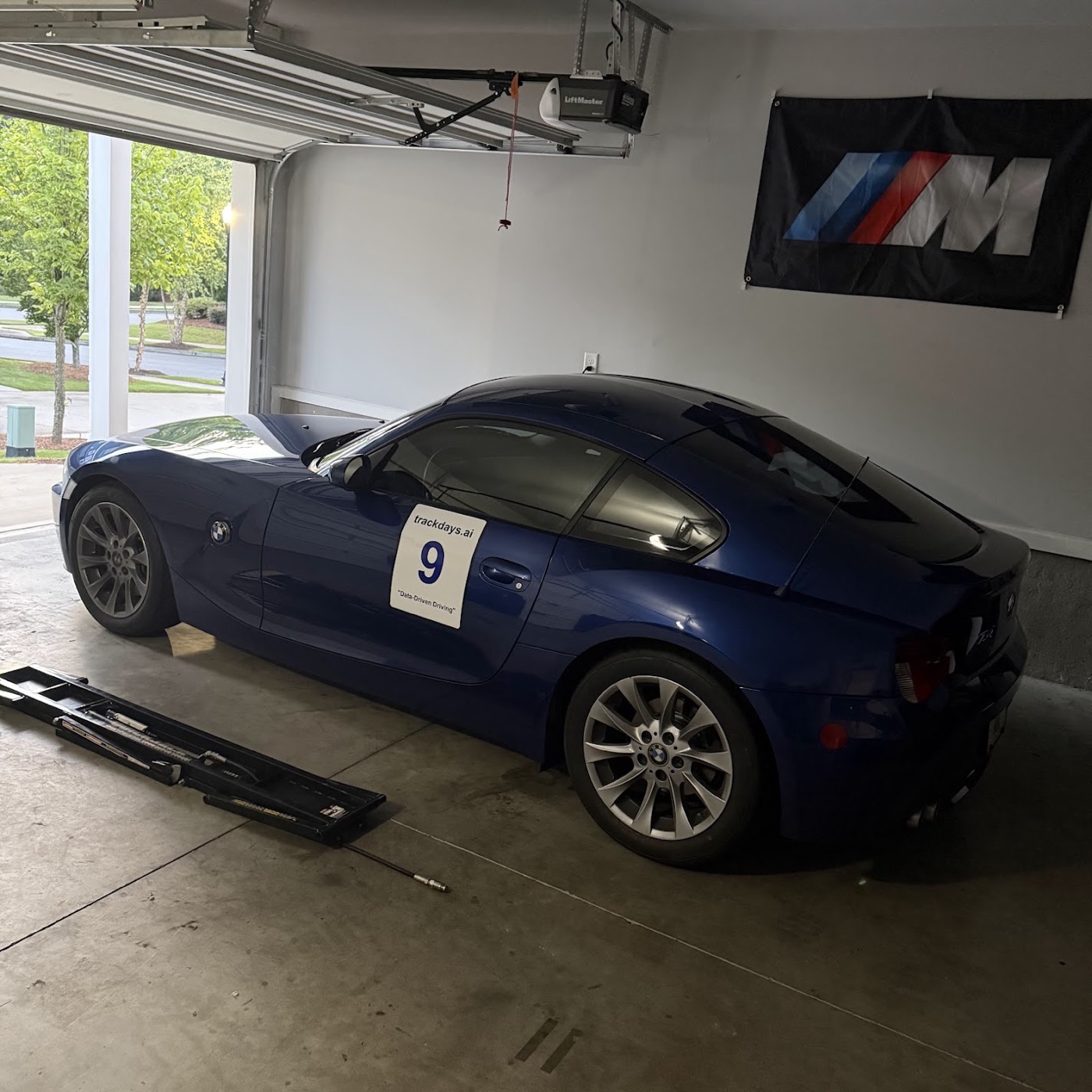 The E86 in the garage wearing its number 9