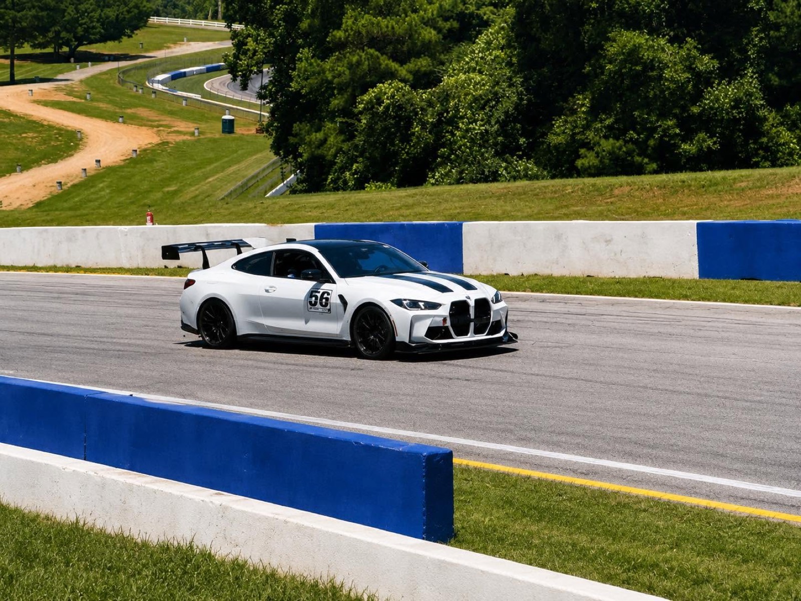 James's white BMW M4 #56 HyperSphere on track at Michelin Raceway Road Atlanta