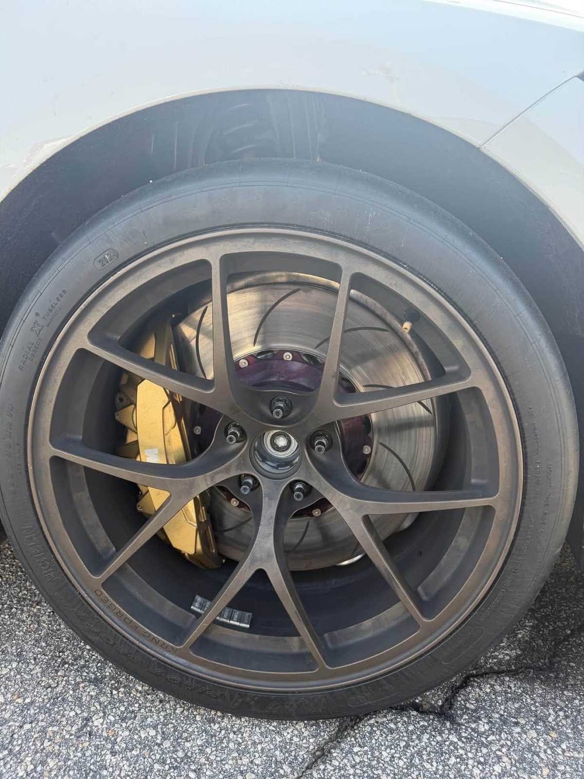 KRNC forged wheel on Michelin slick over Girodisc rotor and gold caliper running G-LOC pads